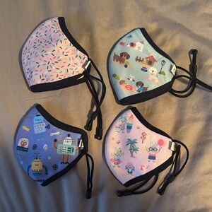 Four kids’ size small Happy Masks (N95 equivalent, washable)